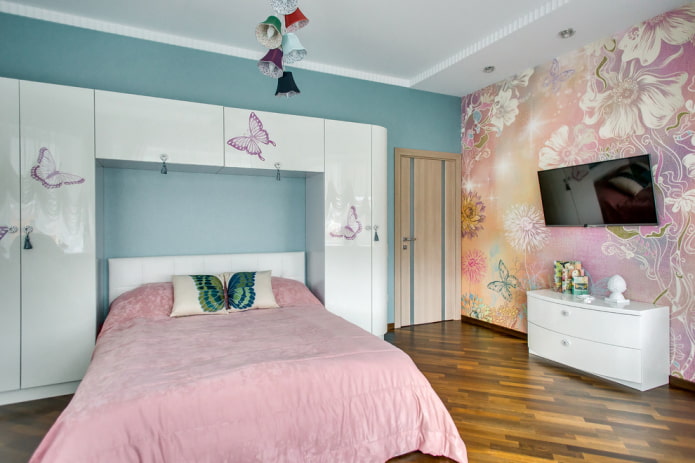 teenage bed with a bedspread in a girl's room