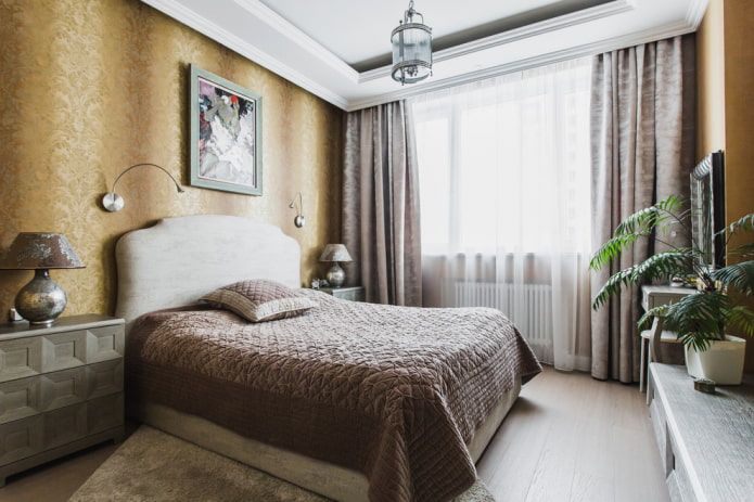 bed with a brown bedspread in the bedroom