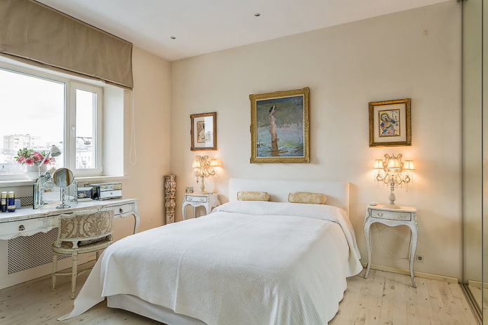 bed with a white bedspread in the bedroom