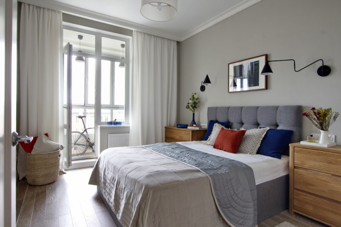 bed with a double-sided bedspread in the bedroom