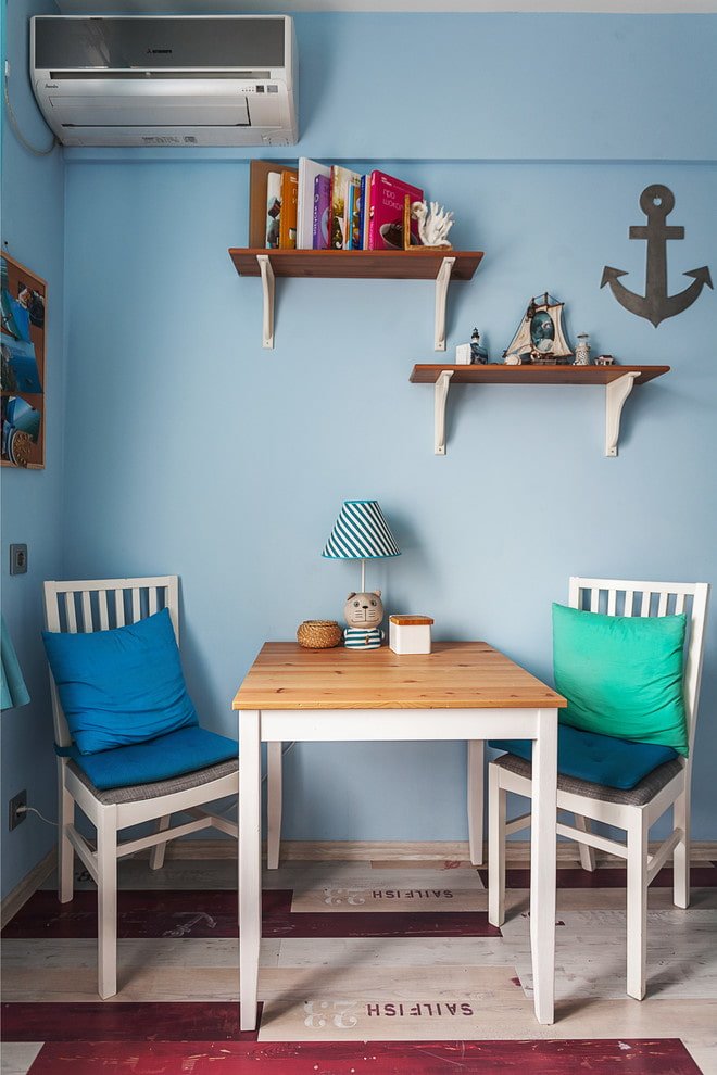 shelves above the table in the kitchen interior
