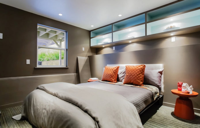 shelves above the bed in the bedroom interior
