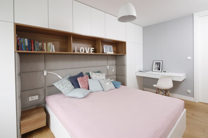 open shelves above the bed in the interior