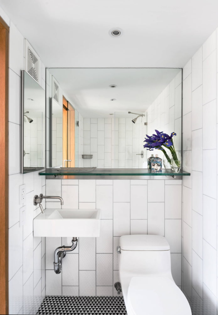 Glass shelf under the mirror
