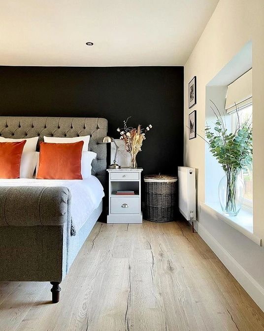 Laundry basket in the corner of the bedroom