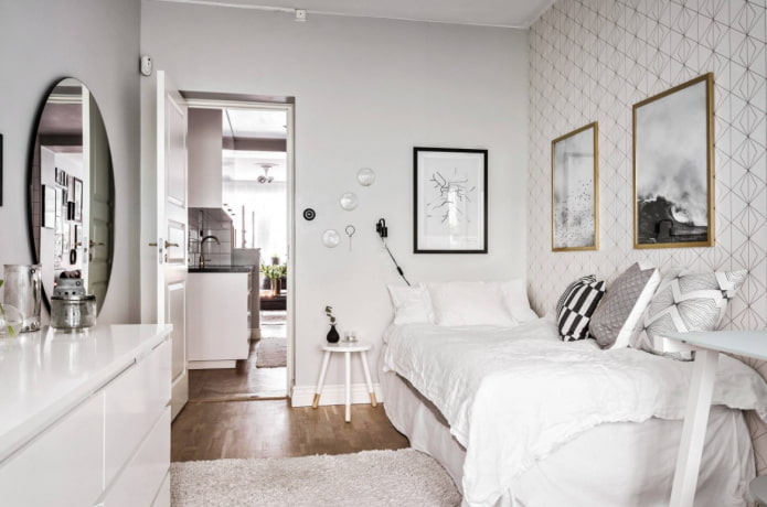 wallpaper with a geometric pattern near the bed