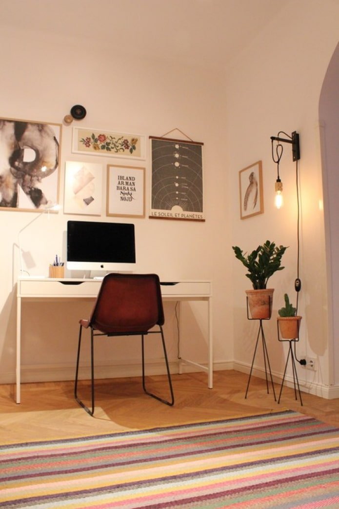 paintings above the desk