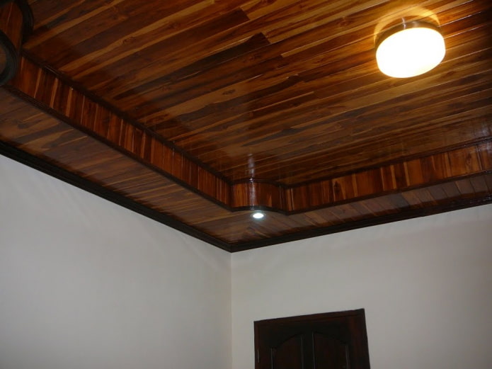 two-level ceiling structure covered with clapboard