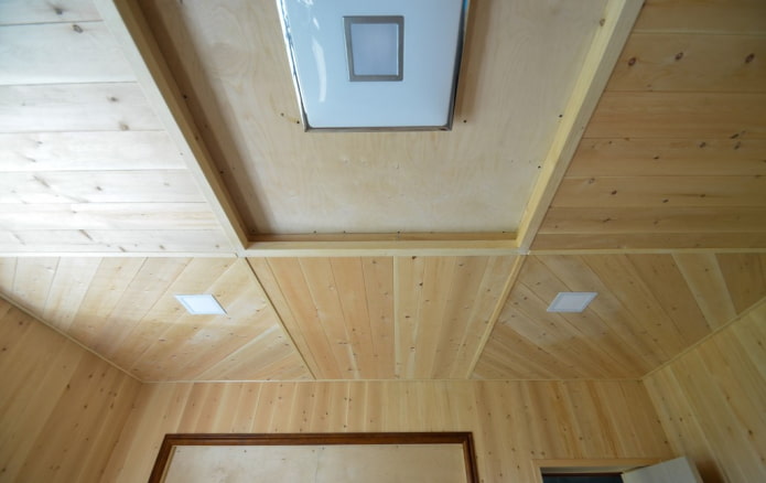 two-level ceiling structure covered with clapboard