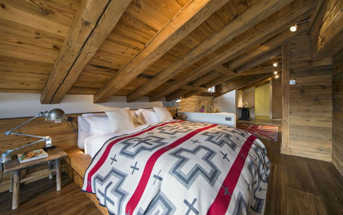 wooden ceiling structure in the attic in the chalet style