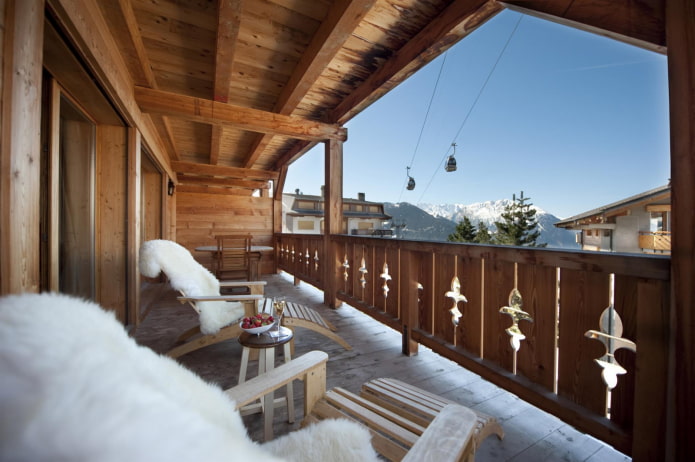 wooden ceiling on the loggia in the chalet style
