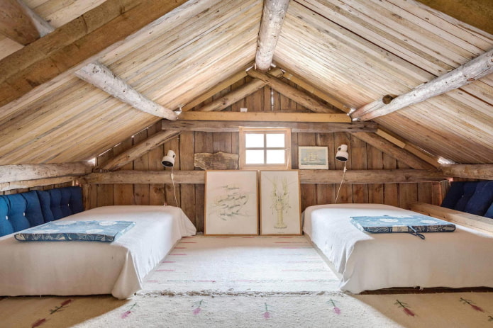 lining the walls and ceiling of the attic bedroom with unedged boards