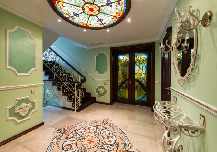 ceiling design in a hallway with stairs