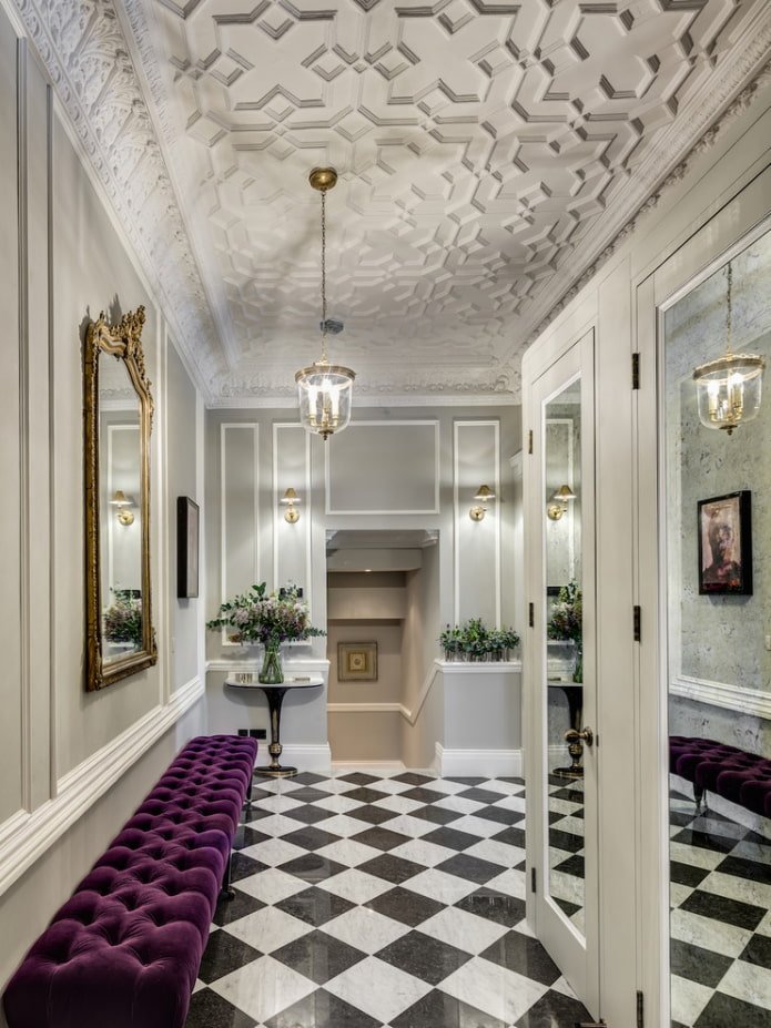 stucco on the ceiling in the interior of the hallway