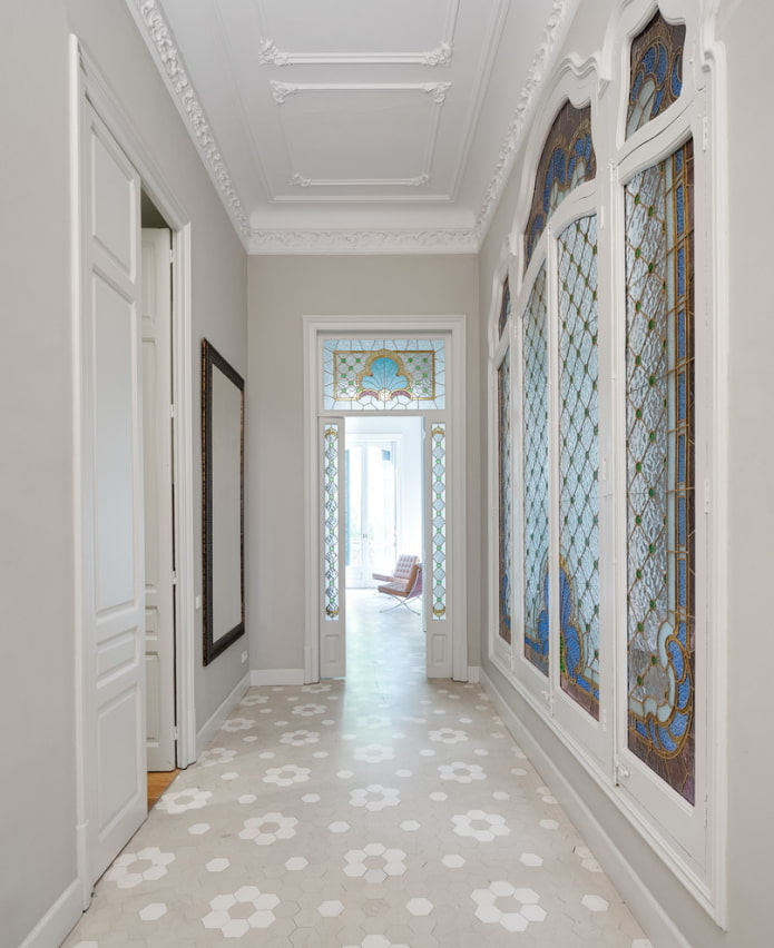 stucco on the ceiling in the interior of the hallway