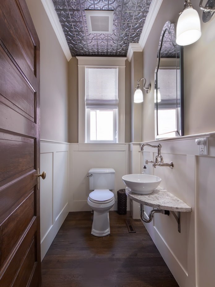 tiles on the ceiling in the bathroom