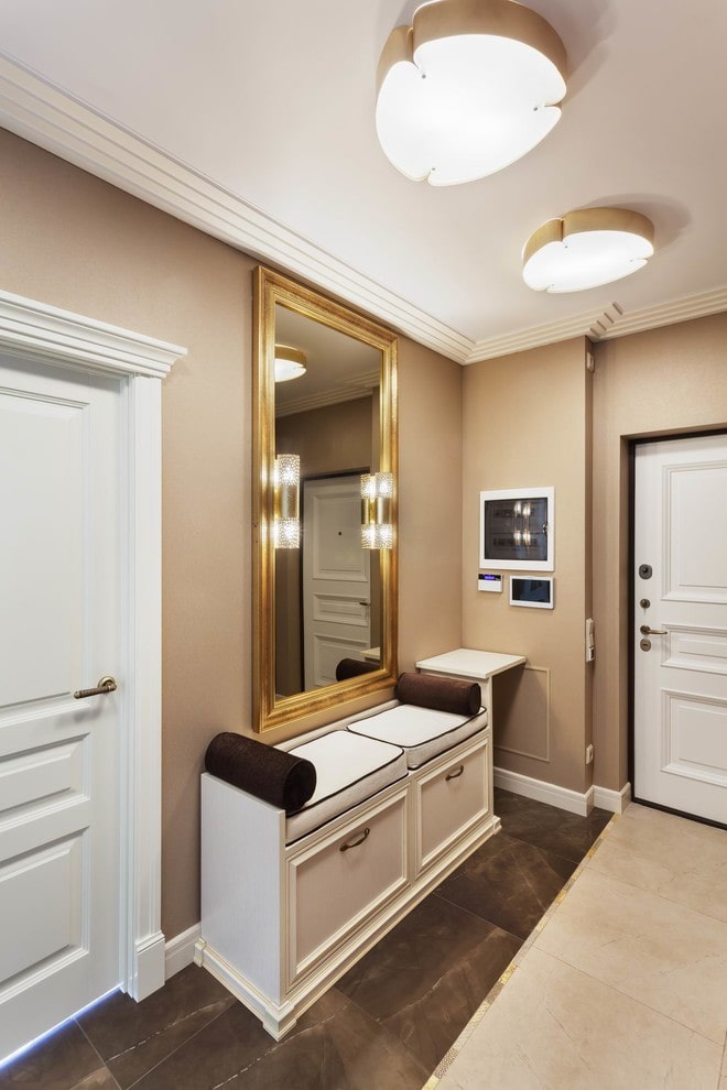 seat with space for shoes in the interior of a narrow corridor