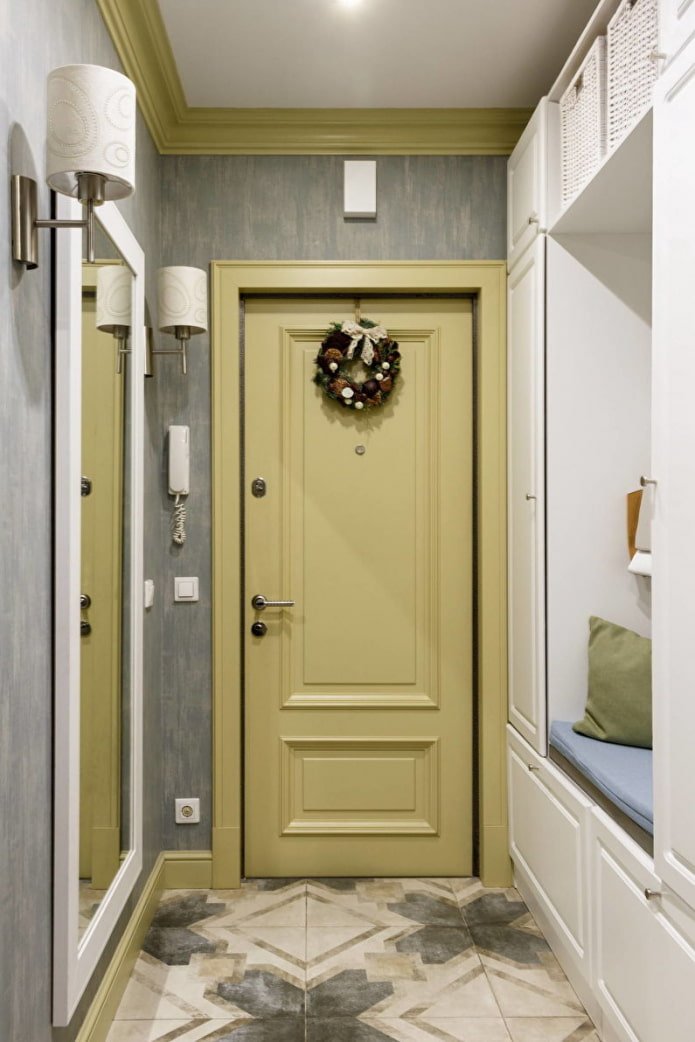 full-length mirror in the interior of a narrow corridor