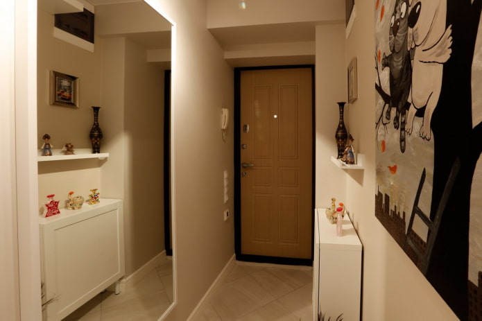 hallway with a large mirror