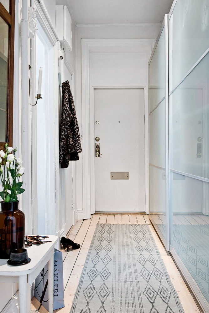 narrow scandinavian hallway design