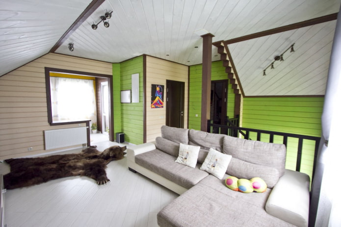 white, green and beige living room in a wooden house