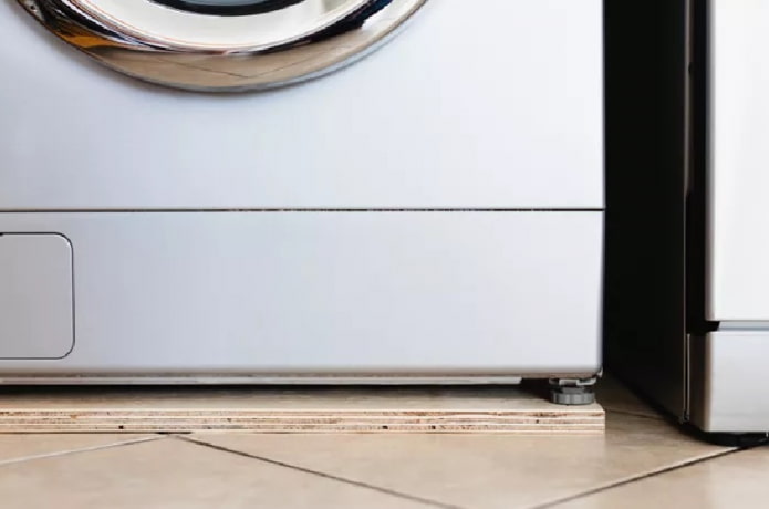 Plywood under the washing machine