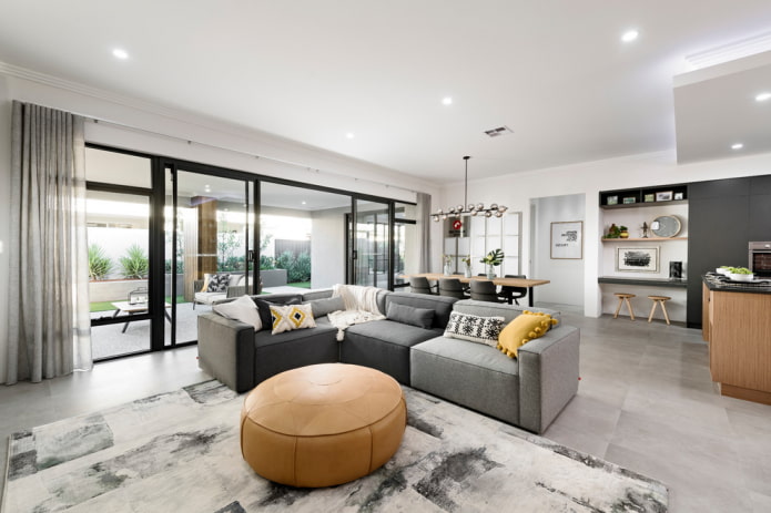 beige pouf in the interior of the kitchen-living room