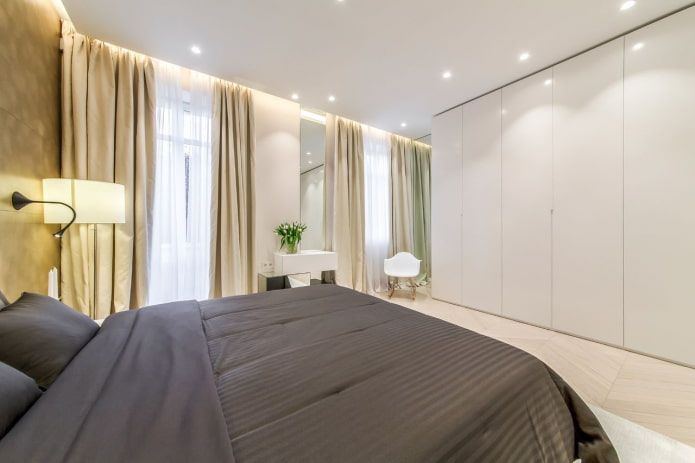 spotlights around the perimeter of the bedroom