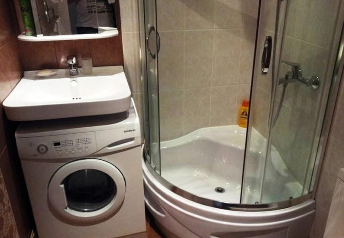 shower cabin and washing machine under the sink