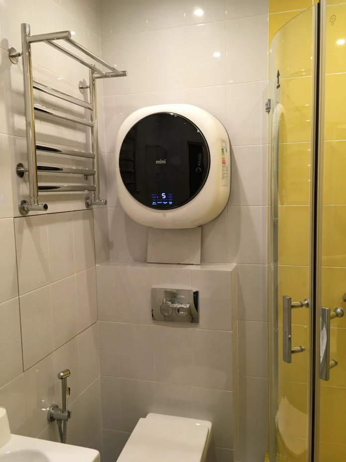 compact washing machine on the wall