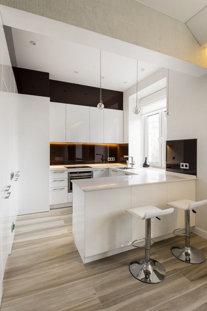 white kitchen with a peninsula