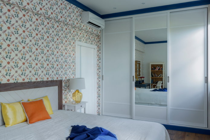 wardrobe with sliding doors in the bedroom