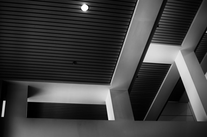 black slatted pendant structure