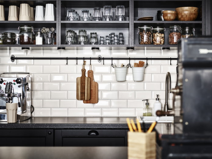 black railing under the shelves