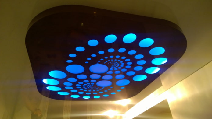 perforated canvas with illumination from cutouts