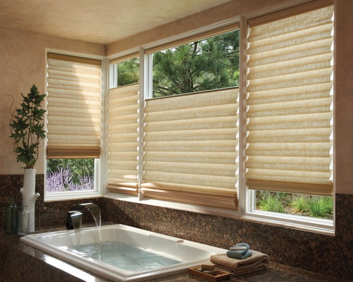 cascading roman curtains in the bathroom