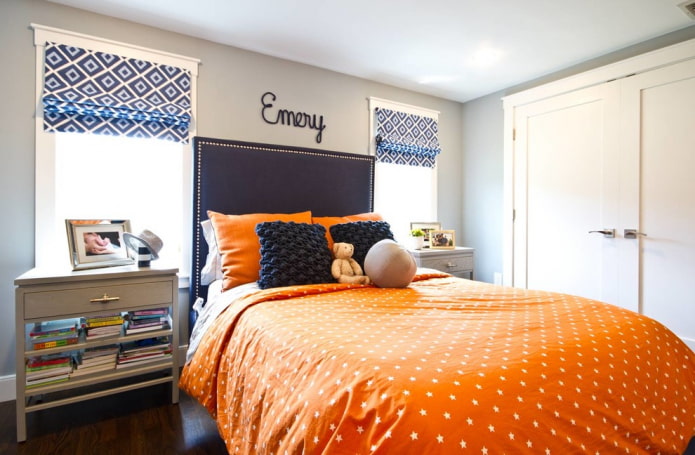 patterned roman curtains in the nursery
