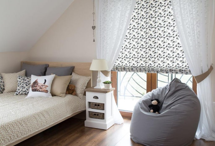 Roman blinds with curtains in the nursery