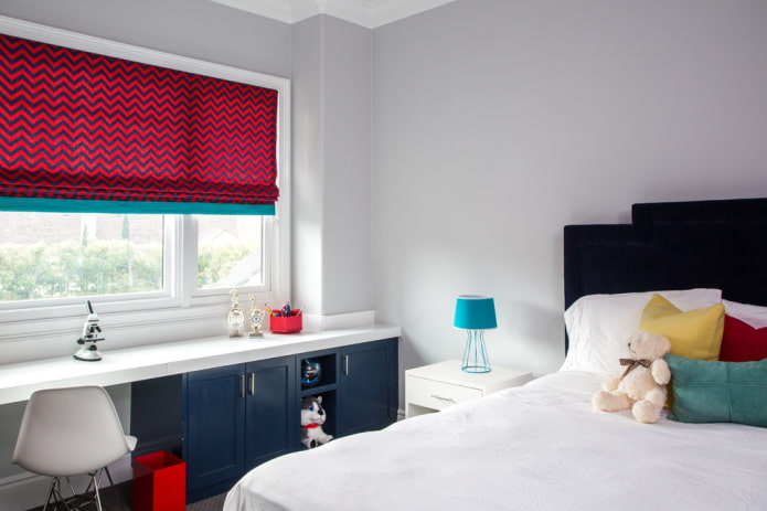 roman curtains with a geometric print in the nursery