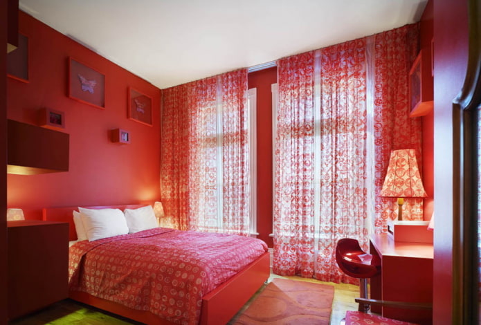 bedroom interior in pink and red tones