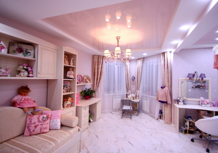 pink glossy stretch ceiling in a children's room