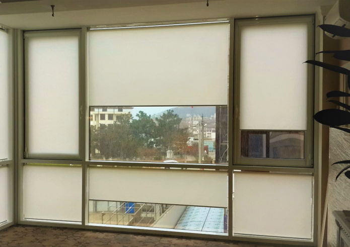 roller blinds on the loggia with panoramic glazing
