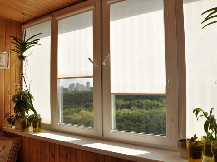 white roller blinds on the loggia