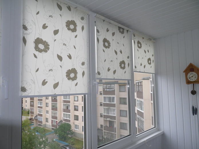 roller blinds with a floral print on the loggia