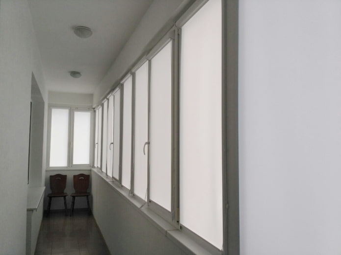 white roller blinds on the loggia
