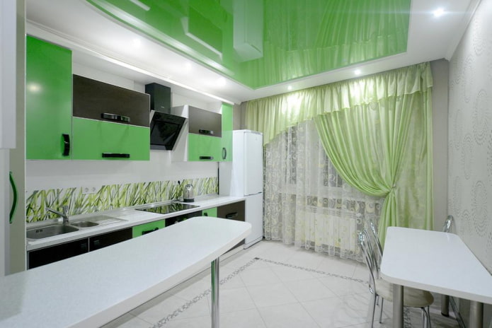 curtains in the kitchen interior in light green tones