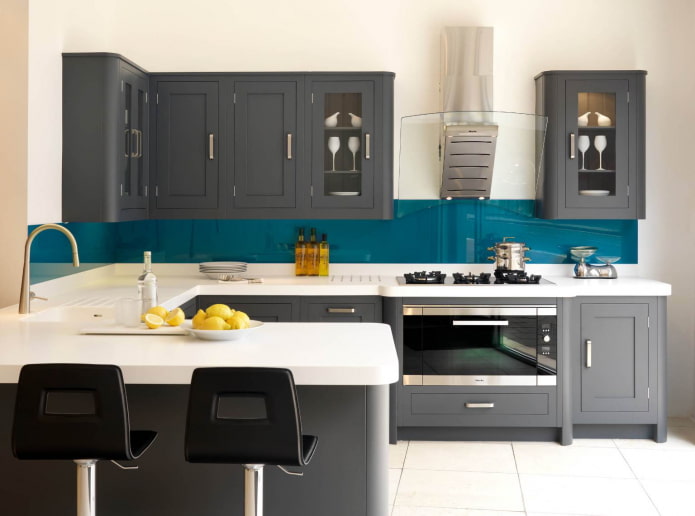 turquoise splashbacks in a gray and white kitchen