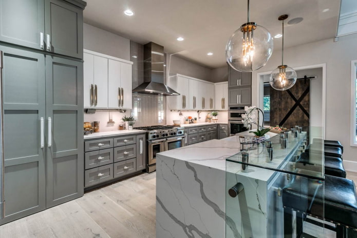 glass and metal elements in a gray and white kitchen