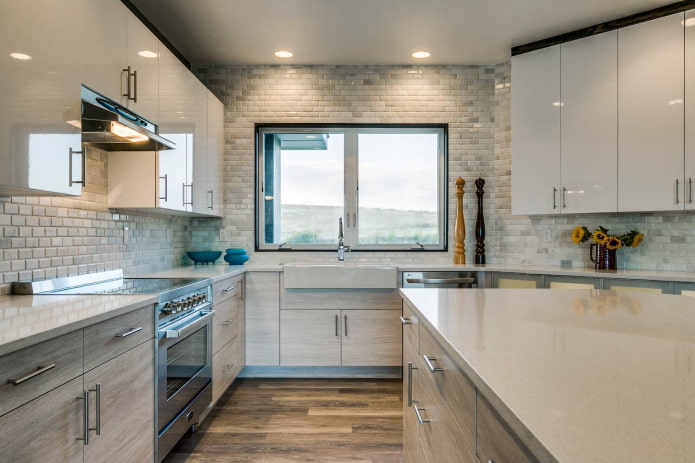 painted brick walls in a gray and white kitchen
