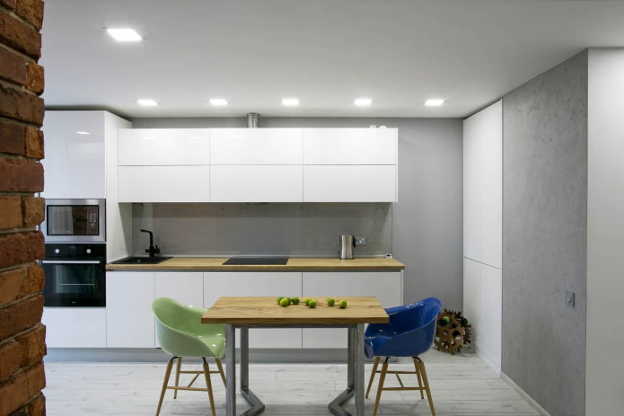 multicolored plastic chairs in a gray and white kitchen